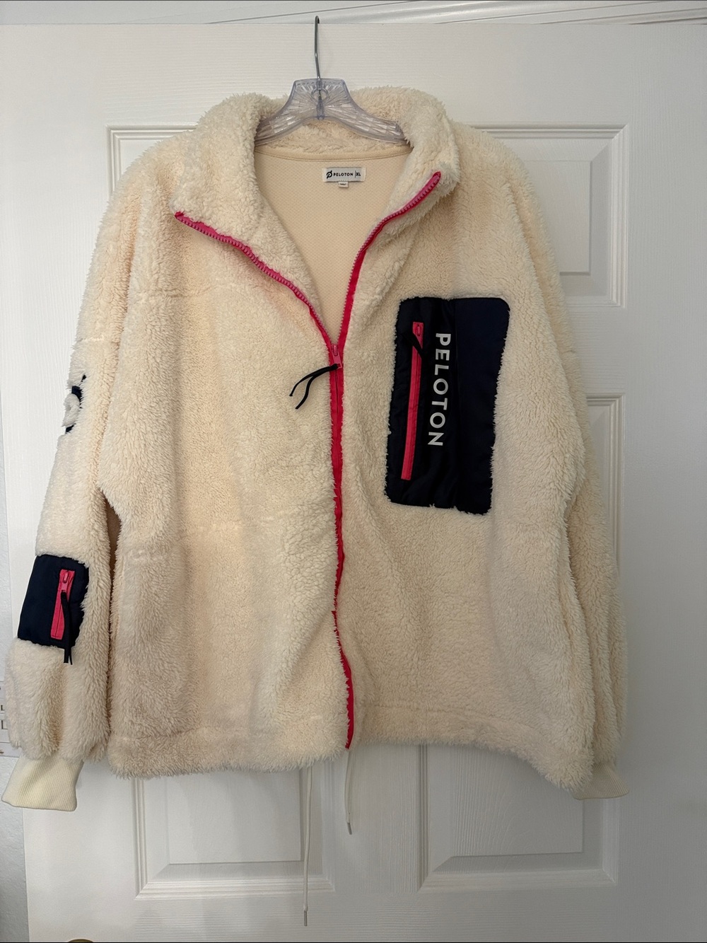 Peloton Cream Sherpa Jacket with Navy Pocket and Pink Trim